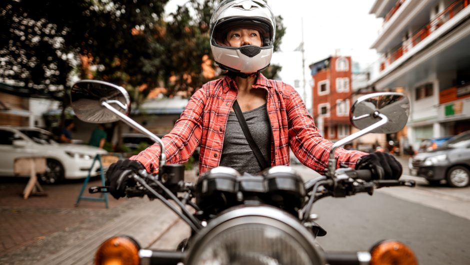 Filipino motorcyclist on motorcycle